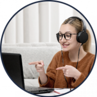 student-online-cute-girl-glasses-sweater-studying-computer-smiling